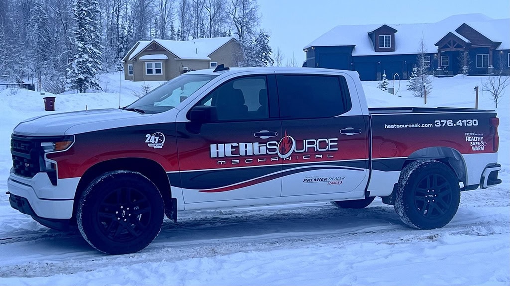 HeatSource Mechanical truck outside a Wasilla, AK, neighborhood.