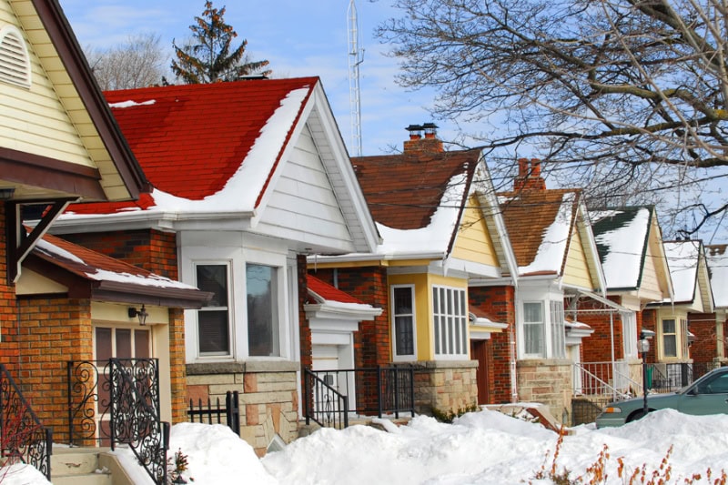 Residential homes in Wasilla, AK, dealing with extreme cold weather and snow.